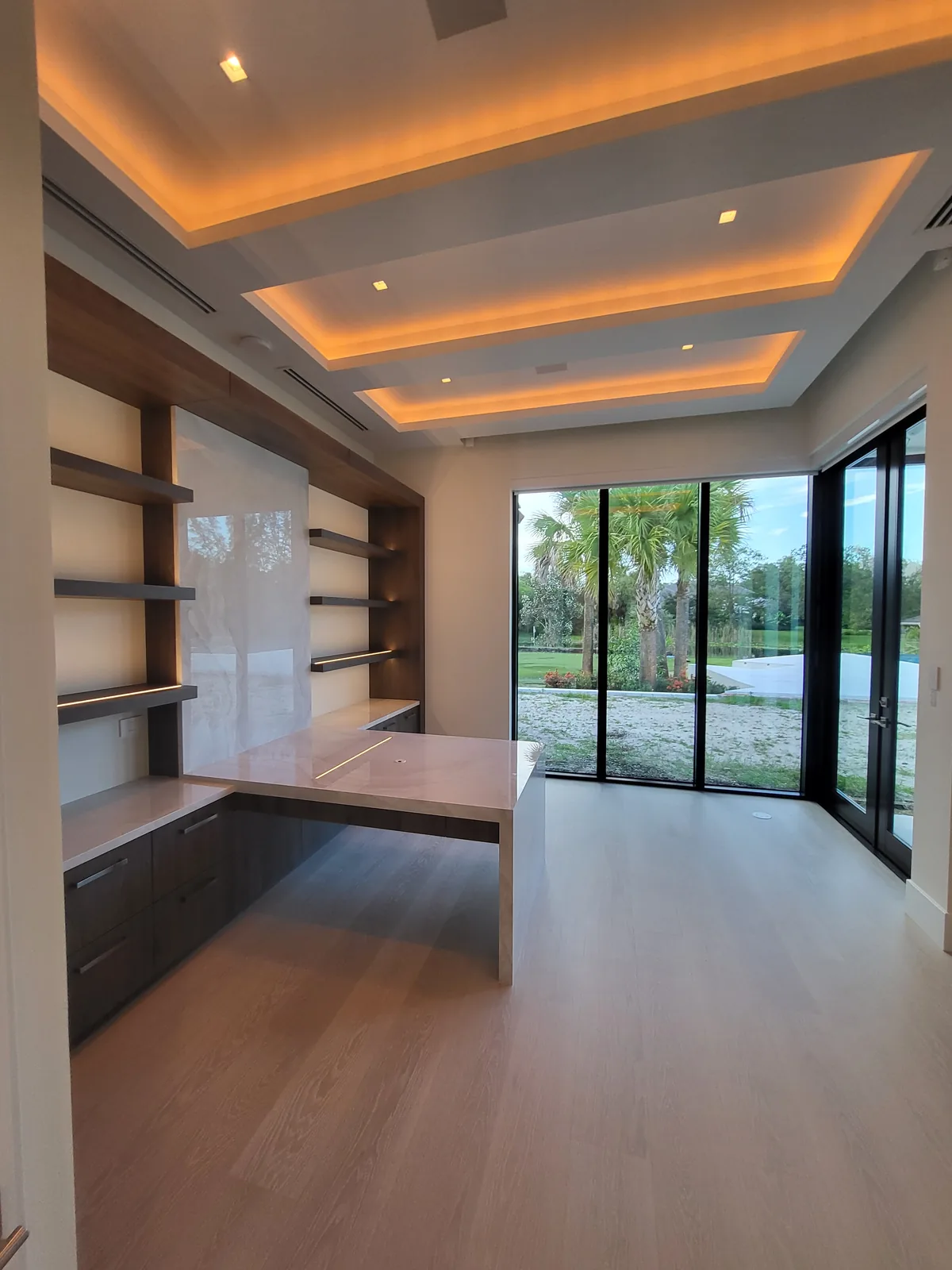 Custom home interior with floating staircase by Red Spade Repairs in South Florida