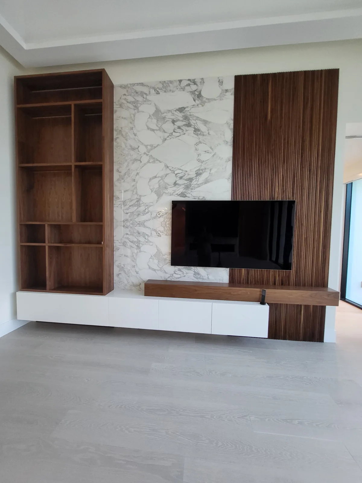 Custom millwork feature wall by Red Spade Repairs in South Florida